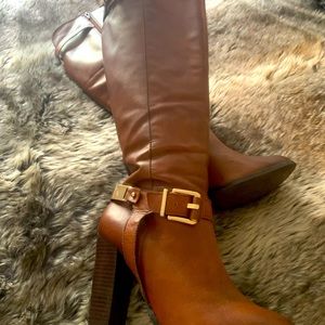 Stylish Tall brown leather boots with gold accents